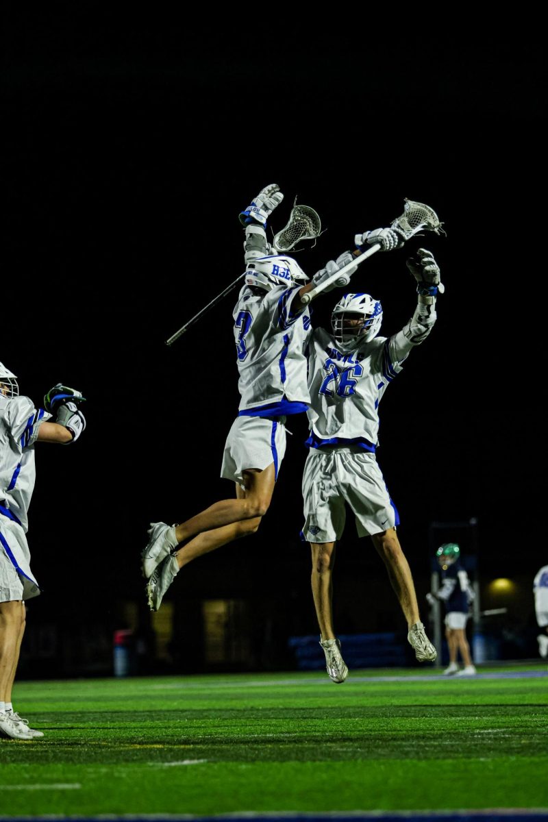 Senior Trey Boysen #3 Celebrates with Sophomore Kyle Jenkins #26 after a team goal