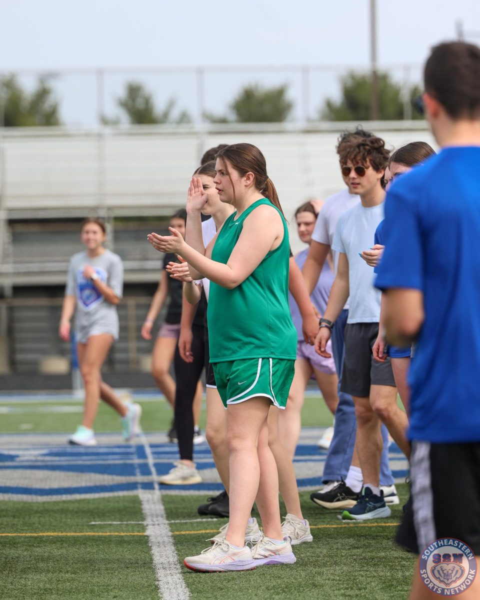 Unified Track huddle before practice