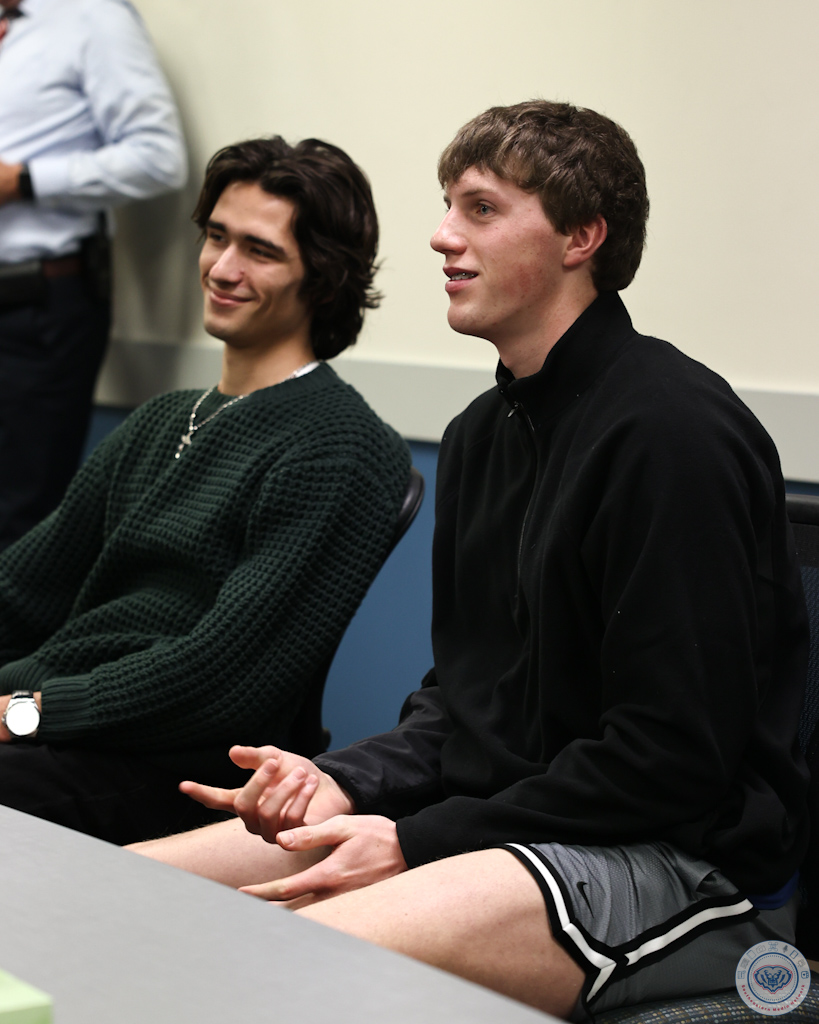 William Henning and Landon Osswald watch S.A.G.E video  on Feb. 25, 2026 at Hamilton Southeastern High School. 