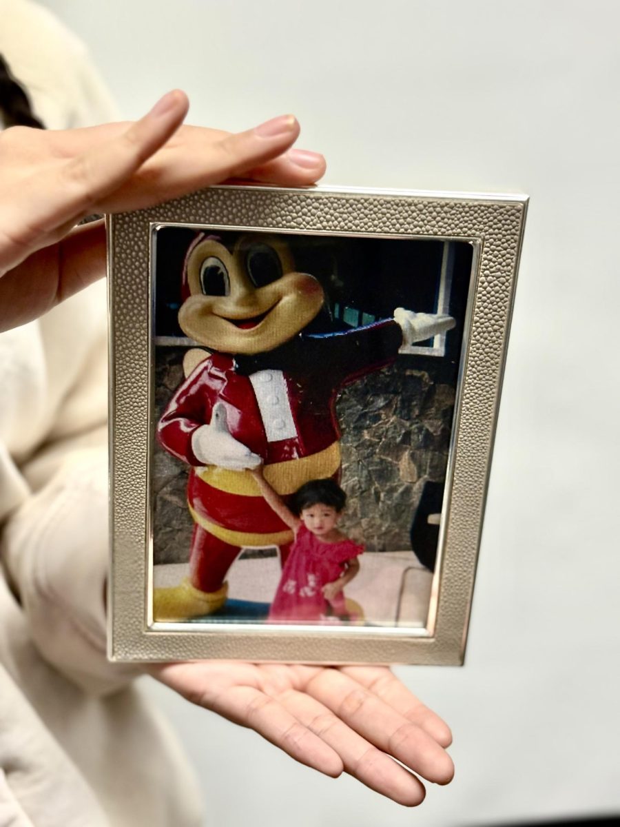 Frame of Ortega in front of the Jollibee Mascot on 27 Mar. 2026